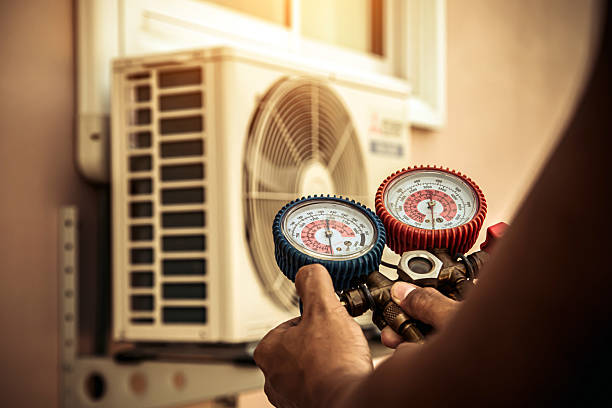 Professional Hvac technician working in Rowland, NC